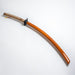 Afro’s Tachi from the anime Afro Samurai. An orange wooden laquered sheath.
