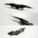 Closeups of the Batarang, including the tips of the blades and the back, which includes a clip.