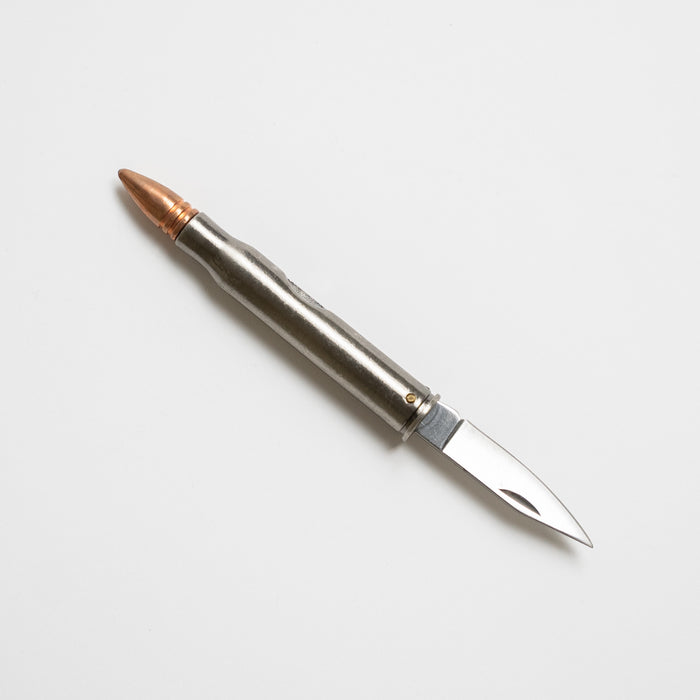 A folding knife shaped like a bullet.
