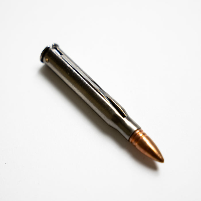 A folding knife shaped like a bullet. The knife is concealed.