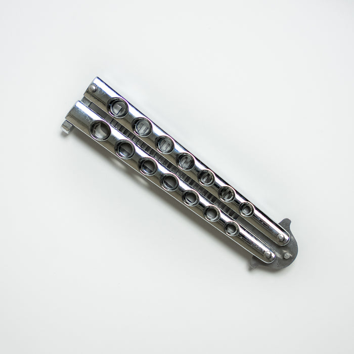 Closed Comb-style balisong trainer used to practice butterfly knife handling techniques and tricks safely