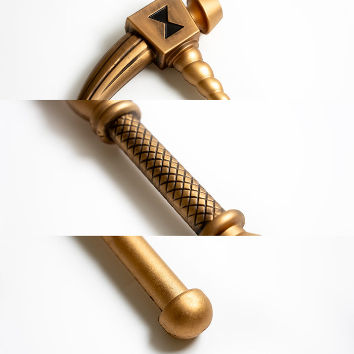 Closeups of the handle, head and pommel of Diane’s Warhammer Gideon Sacred Treasure from the Seven Deadly Sins anime and manga. It is a golden-brass warhammer made of foam.