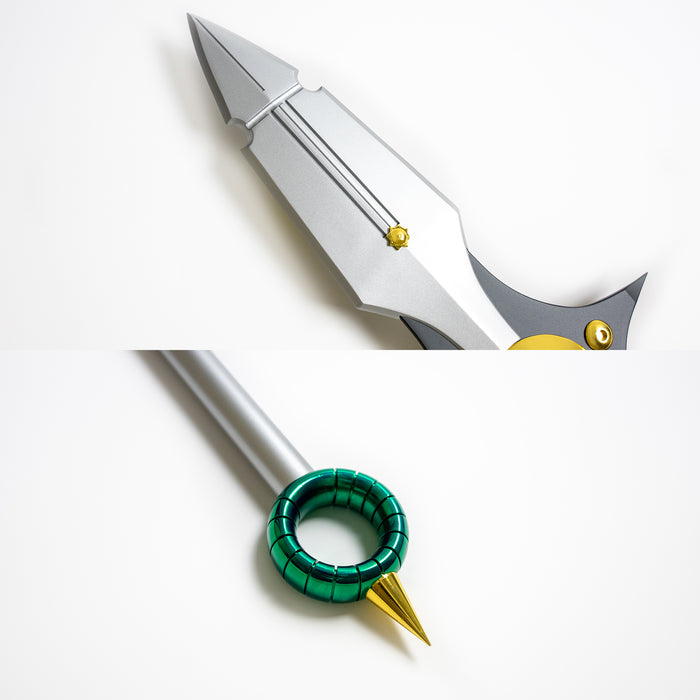 Detail shots of the spearhead and pommel of King's Spirit Spear Chastiefol made of metal from the anime and manga series Seven Deadly Sins. It is a silver spear with green and gold detailing.
