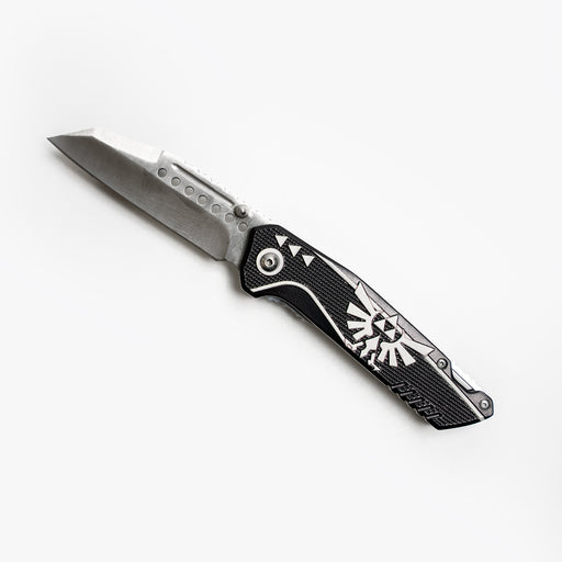 Black Folding knife with the Legend of Zelda Hylian triforce symbol from The Legend of Zelda series, blade open