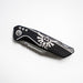 Black Folding knife with the Legend of Zelda Hylian triforce symbol from The Legend of Zelda series, closed
