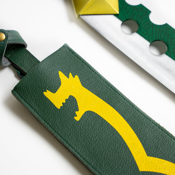 Closeup of the green sheath with a yellow dragon motif of Meliodas' Lostvayne from the Seven Deadly Sins