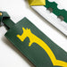 Closeup of the green sheath with a yellow dragon motif of Meliodas' Lostvayne from the Seven Deadly Sins