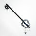 A black and blue handle key blade from Kingdom Hearts video game series - with a metal crown on a chain dangling from the handle.