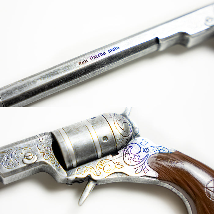 Detail shots of the Colt from Supernatural - designs are etched into the silver surface and the words non tembo mata are on the barrel. A pentagram is etched into the handle.