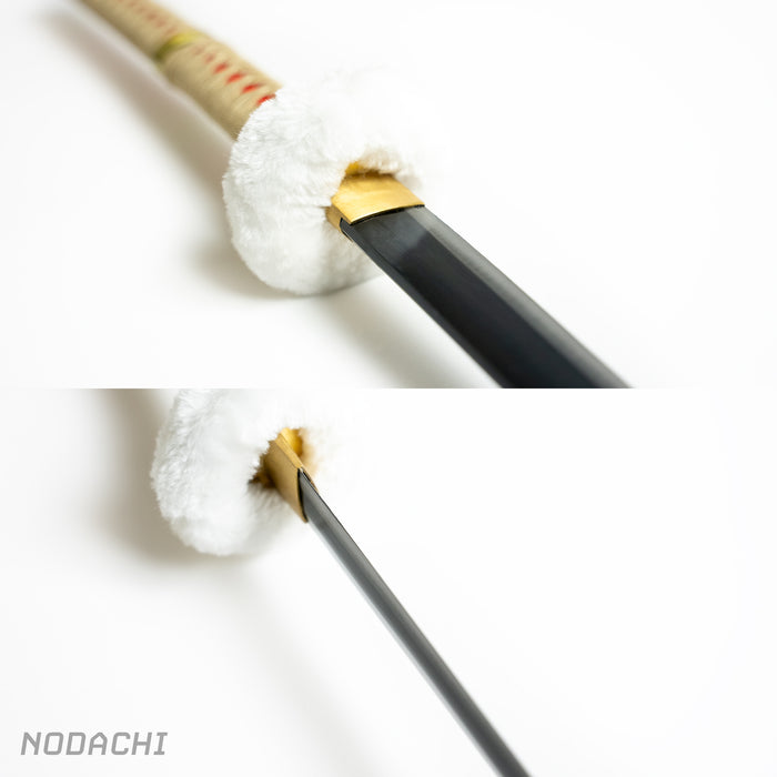 Closeup of the furry guard and black sheath of the Kikoku, Law’s nodachi from One Piece.